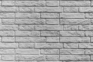 Gray brick wall, front view. Backgrounds.