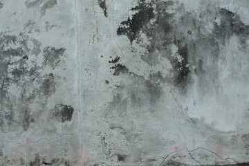 Old dark concrete wall as background. Horror and Grunge background