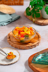 Rujak aceh or Rojak is dish from Java. Rujak consists of a mixture of sliced fruit and vegetables served with spicy palm sugar sauce.
