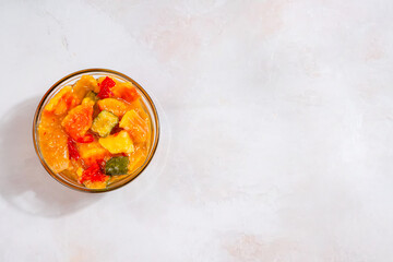 Rujak aceh or Rojak is dish from Java. Rujak consists of a mixture of sliced fruit and vegetables served with spicy palm sugar sauce.