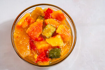 Rujak aceh or Rojak is dish from Java. Rujak consists of a mixture of sliced fruit and vegetables served with spicy palm sugar sauce.