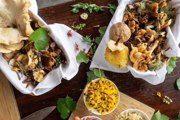 A variety of foraged ingredients on display table looking down