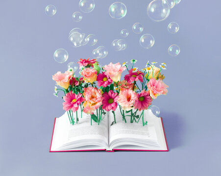 Book with flowers. Summer holidays or back to school concept