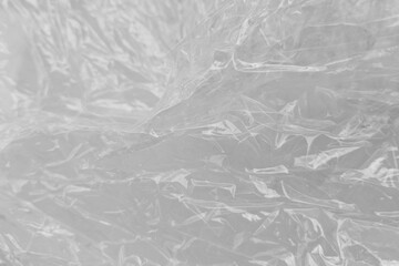 White plastic or polyethylene bag texture, Transparant wrinkled plastic, macro, white background