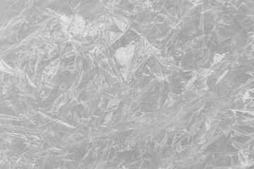 White plastic or polyethylene bag texture, Transparant wrinkled plastic, macro, white background