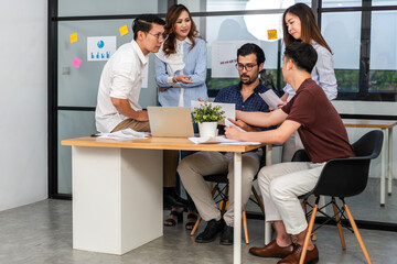 Group of business meeting and discussing strategy with startup project analysis finance,management.Success business people plan and brainstorm,marketing,idea,research,organization in office.Teamwork