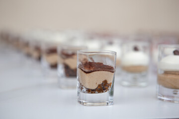 Assorted mini desserts in glass cups