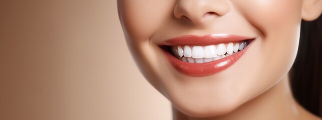 Charming female smile with dazzling white teeth, showing excellent dental health and hygiene. Ideal for dental illustrations. Copy space