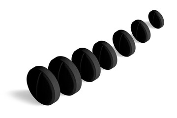 Black pills or capsules. Activated carbon. on isolated transparent background