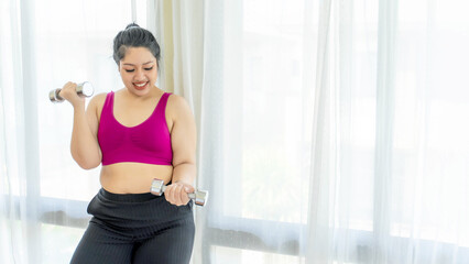 Fototapeta na wymiar Asian fat women , Fat girl , Chubby, overweight plus size in sports wear attempt exercises with dumbbell lifting at the bedroom - lifestyle Woman diet weight loss overweight problem concept