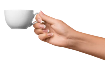 Foto op Plexiglas A woman's hand holds a white cup. on isolated transparent background © MM