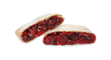 Delicious cut strudel with cherries isolated on white