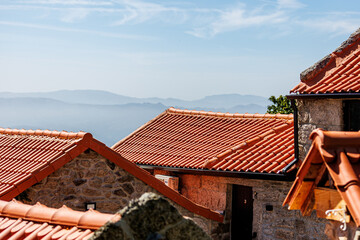 red rooftop with mountain view