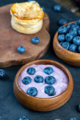 fresh blueberry-flavored yogurt with ripe blueberries