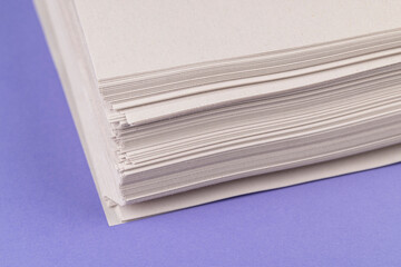 grey low-quality thin paper from recycled waste