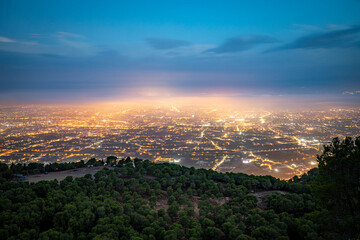 Panoramic view of the orchard of Murcia, Spain, with the city as the protagonist at dawn from the...