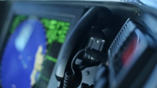 Close up on ship intercom and phone
