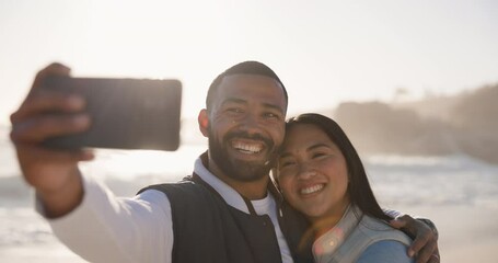 Couple, selfie and happy at beach for vacation, holiday fun or travel with social media. Asian woman and man together at ocean with interracial love, profile picture and adventure memory outdoor - Powered by Adobe