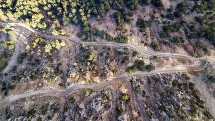 Drone view of the mountain road going to the top of Mount Babadag in Oludeniz Fethiye Turkey