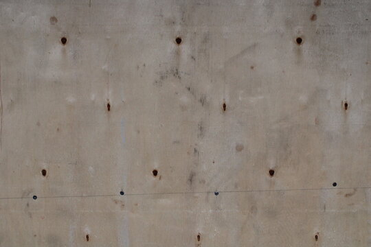 Old wood with rusty nail marsks