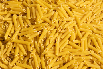 Ready for cook dry yellow penne, pasta