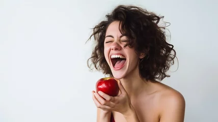 Fotobehang woman with an apple © Karen