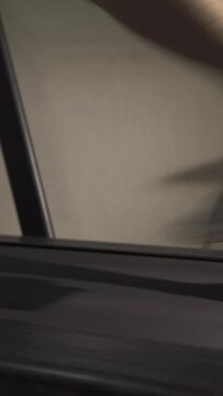Male runner running at a fast pace on a treadmill