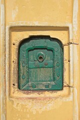 small window with wooden door at Hawa Mahal, Jaipur, Rajasthan , India 