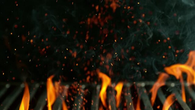 Super Slow Motion Shot of Cast Iron Grate with Fire Flames. Filmed on High Speed Cinematic Camera at 1000 FPS.