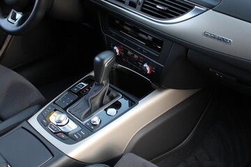 Automatic transmission gearshift stick, Closeup a manual shift of modern car gear shifter. Close up of the automatic gearbox lever, black interior car.