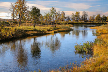 Autumn on the river in the mountains