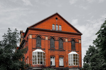 Facade of old brick house. Red bricks.