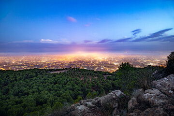 Panoramic of the orchard of Murcia, Spain, with the city as the protagonist at dawn from the rocky...