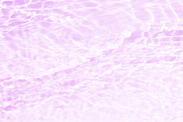  Purple water with ripples on the surface. Defocus blurred transparent pink colored clear calm...