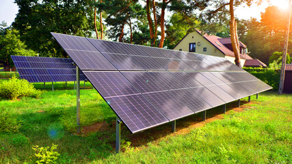 Solar panels with a large surface. Photovoltaic panels standing on a paved surface against the...
