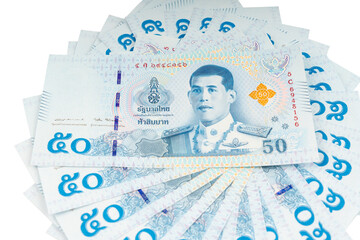 Closed up the Thai banknote fifty baht isolated on white background © gamjai