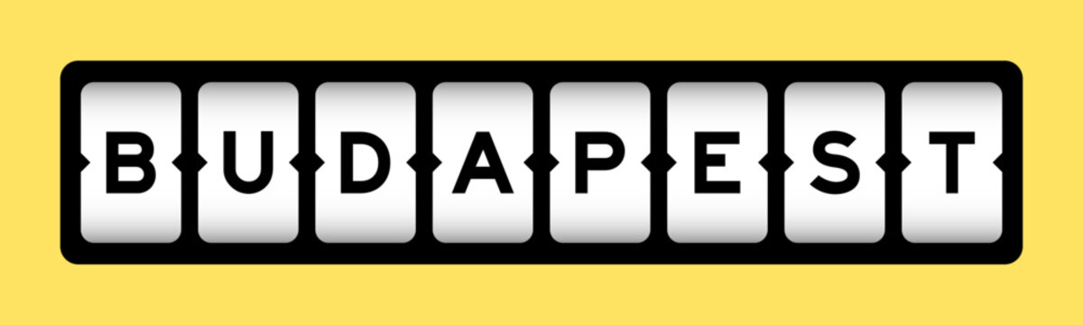 Black color in word budapest on slot banner with yellow color background