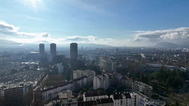 Grenoble's aerial tapestry: Is&egrave;re, ancient fortresses, and modern economy.
