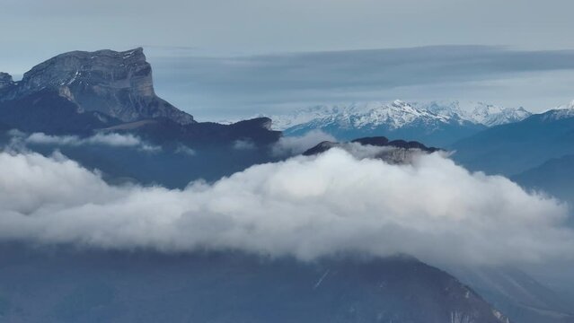 Mysterious atmosphere clouds over mountains Grenoble 