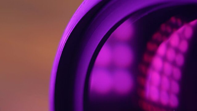 Camera lens with lens reflections on blur. Media and technology concept background.