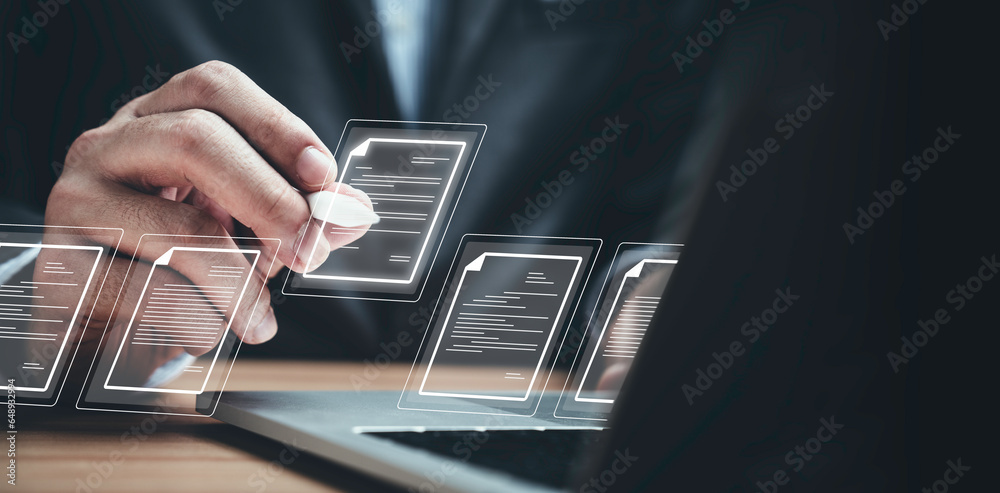Aufkleber Businessman using laptop computer and touching to online electronic paper for approve ISO quality document control certification and project approval concept.
