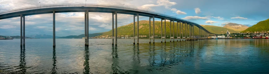 Fotobehang Tromsø city bridge, crossing the Tromsøysundet strait between Tromsdalen on the mainland and the island of Tromsøya, Troms of Finnmark, Norway © Luis