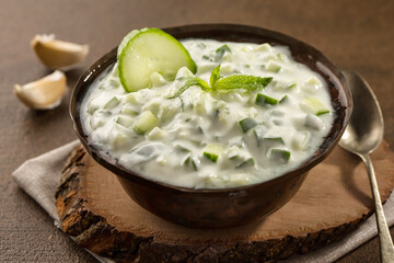 cucumber raita yogurt served in dish isolated on food table top view of middle east spices - obrazy, fototapety, plakaty