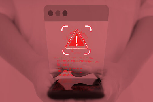 A hand is touching the screen to warn of an abnormality due to a hacker attack. Cyber ​​Anomaly Notification cyber attack,hacker attack maintenance concept and hacking cybersecurity
