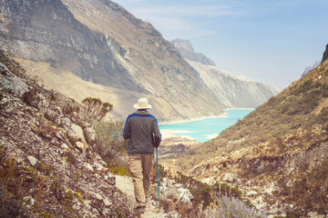 Naklejka premium Hiker on lake Paron