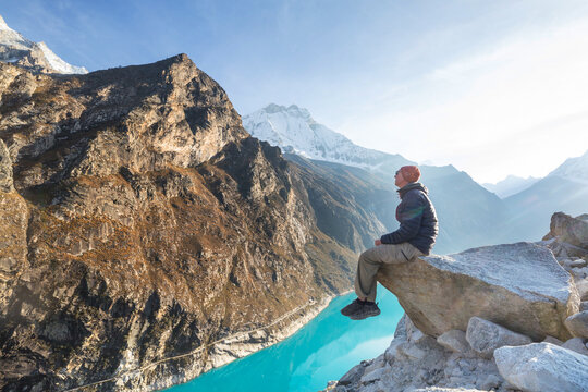 Hiker on lake Paron