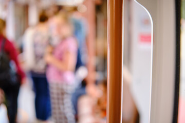 Blurred image of people traveling by train. Abstract blurred background.