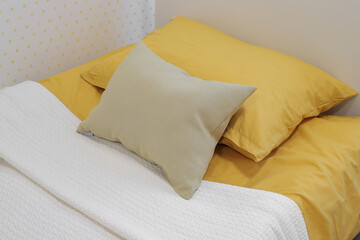 Pillows on baby bed close-up