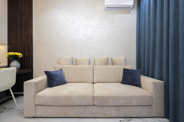 Sofa in the interior of the living room