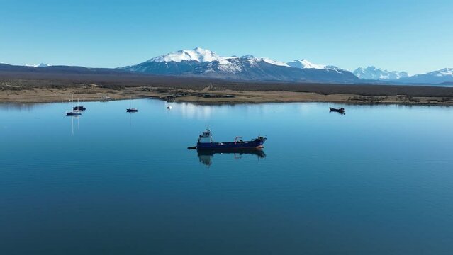 Boat Sailing At Puerto Natales Magallanes Region Chile. Riverside Puerto Natales Magallanes Region. Sun Tourism Ranch Mountains. Sun Glacier Ranch Lakeshore Outdoor. Sun Mountains Sunlight Forest.